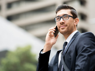 Portrait of handsome businessman outdoor