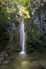 Fototapeta na wymiar Susara waterfall in the Nera National Park, Romania