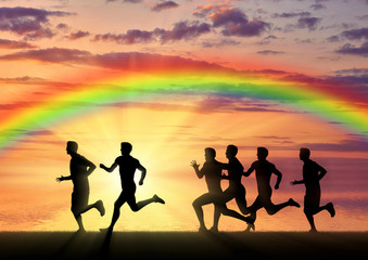 Runners on a rainbow background and sea