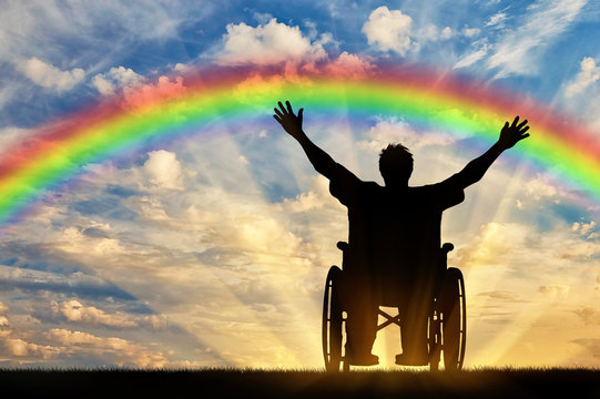 Happy disabled person in a wheelchair