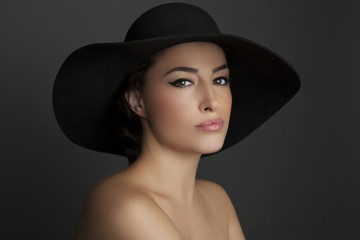 woman with black hat