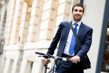 Young businessmen with a bike