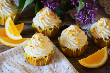 Homemade cupcakes with oranges