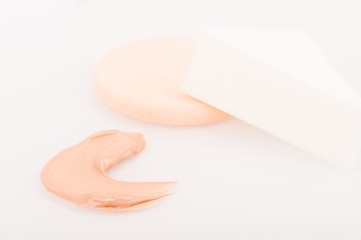 Liquid tinted make-up cream foundation sample stroke and sponges