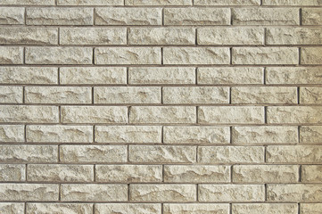 Fototapeta premium Old beige brick wall background texture