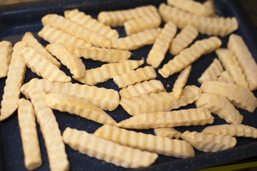 Frozen crinkle cut potato chips