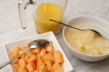 Bowls of Fruit and Pitcher of Juice