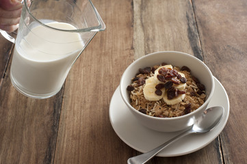 milk being poured for breakfast