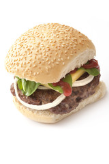 Homemade hamburger on a fresh sesame bun