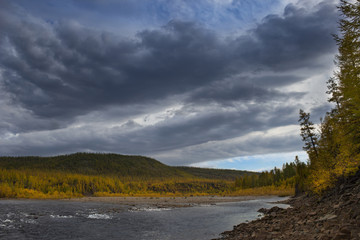 Cloudy autumn landscape
