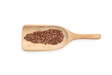 Some linseeds on a wooden spoon with white background