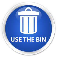 Use the bin (trash icon) blue glossy round button