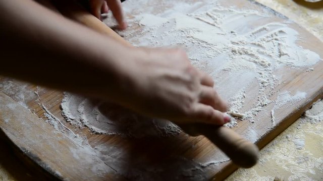 Housewife roasts chebureks in pan - Georgian national dish