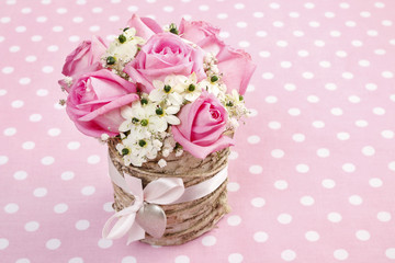 Easter flower decoration with pink roses and ornithogalum arabic