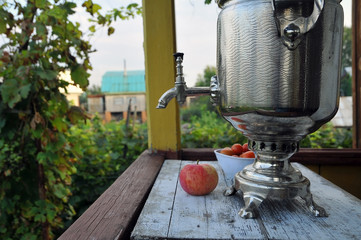 Samovar traditional russian teapot in the garden 