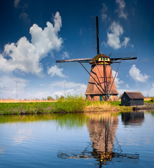 Naklejka premium Sunny spring scene on the canal in Netherlands.