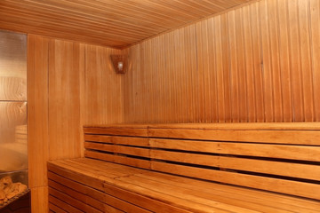 Fototapeta na wymiar Finnish wooden sauna interior with nobody