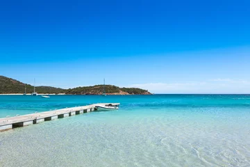 Photo sur Plexiglas Plage de Palombaggia, Corse Ponton dans l& 39 eau turquoise de la plage de Rondinara en Corse I