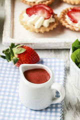 Jug of red sauce