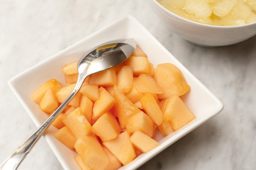Bowl of diced sweet fresh pink melon