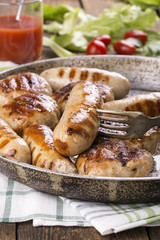 Grilled chicken sausages and burgers.