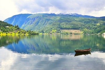 Rowboat in fjord. Ulvik, Norway.