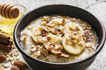 close up of oatmeal in a bowl - obrazy, fototapety, plakaty