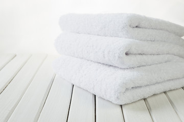 Obraz na płótnie Canvas White fluffy bath towels