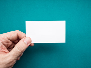White business card Mock up in man's hand