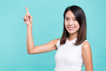 Fototapeta premium Young woman showing finger up