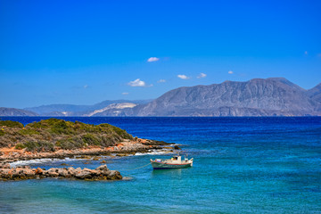 Fototapeta na wymiar Fishing boat near Ammoudara beach. Crete, Greece.