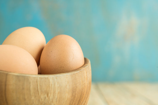Chicken Egg on the wood old background