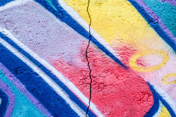 Drawing paint on a concrete wall.