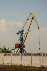 Crane working in the port. Big Cars. acceptance of cargo