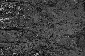 Wall fragment with scratches and cracks