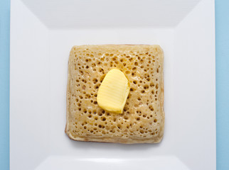 white square bowl with crumpet