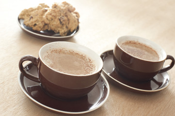 Two cups of cappuccino