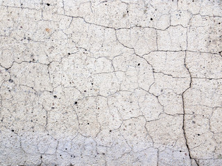 Cracked concrete texture closeup background