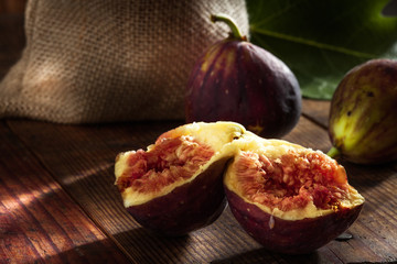 close up view of fresh figs on color back