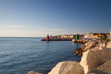 Naklejka premium Sunset view on the coastline in Piran town.
