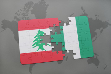 puzzle with the national flag of lebanon and nigeria on a world map background.