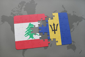 puzzle with the national flag of lebanon and barbados on a world map background.