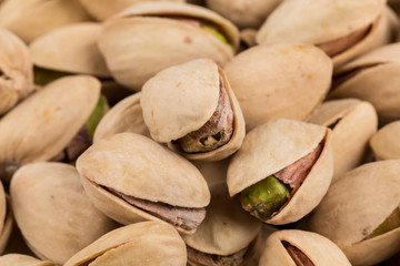 Pistachio nuts arranges as background