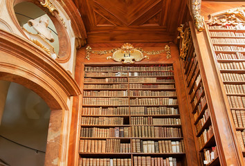 Wooden furniture and bookcase inside the building of the Austrian National Library