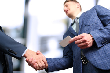 Successful business people shaking hands  at the meeting