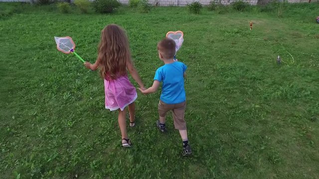 Children With Nets For Catching Butterflies