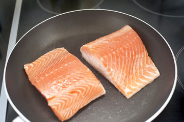 Pan frying salmon steaks