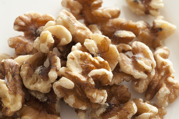 Close Up of Shelled Walnuts on White Background