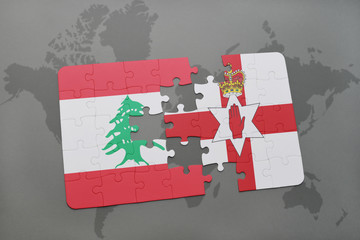 puzzle with the national flag of lebanon and northern ireland on a world map background.