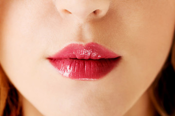 Fototapeta premium Close up of woman lips.